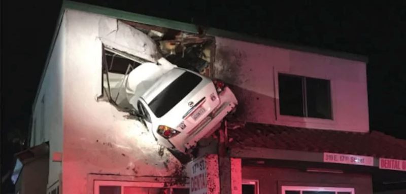 the donald drives car into house